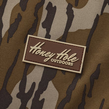 Load image into Gallery viewer, Honey Hole Outdoors Blindside Hoodie in Mossy Oak Bottomland